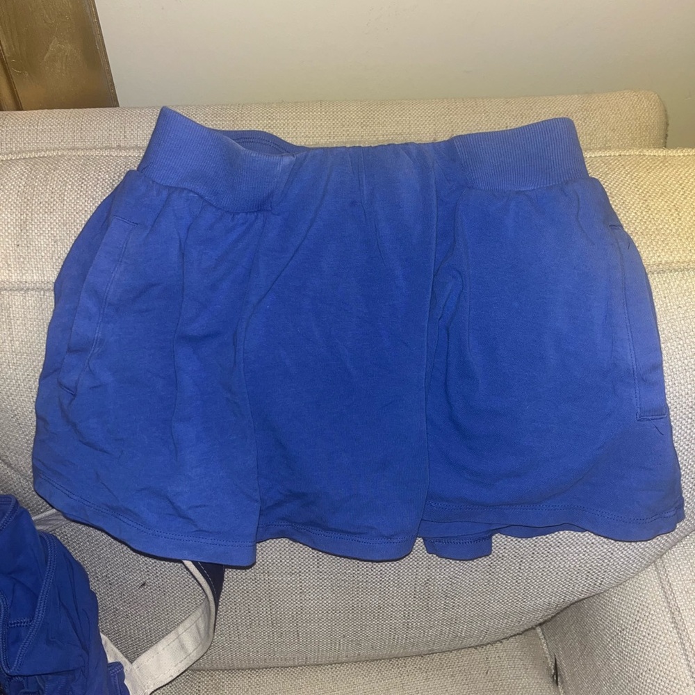 Free people moment top and skirt set. Periwinkle color bluish/ purple ish.